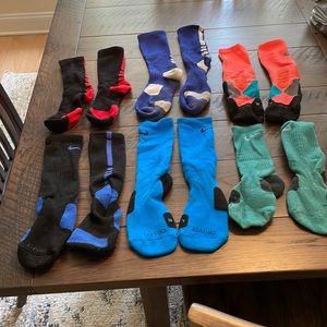 Young mens elite socks, various colors and sizes. Some worn more than others.